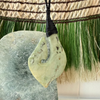 New Zealand Pounamu  hook  necklace with traditional Harakeke Kakadu